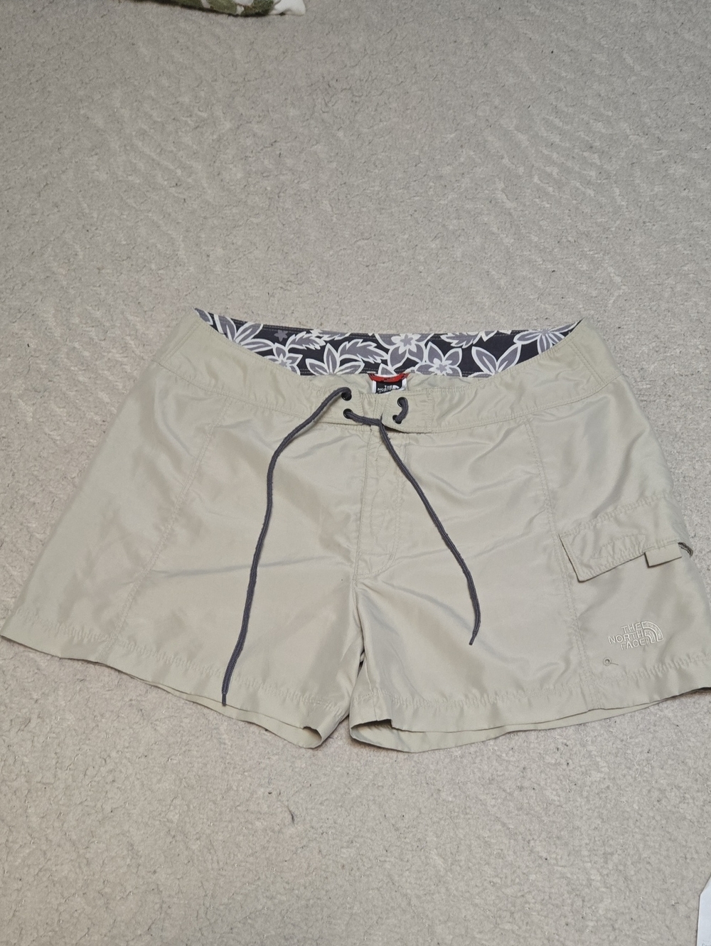 The North Face Tan Women's Drawstring Shorts with Gray Floral Waistband